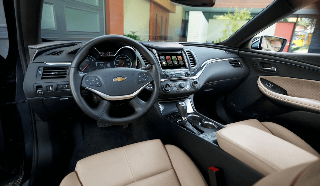 Abundant Amenities Enrich The Drive In The Impala Interior