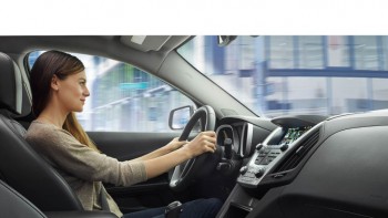 Woman Driving Chevy Equinox