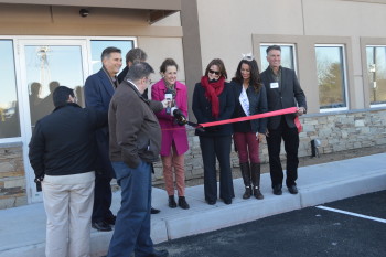 Owners, Gary and John Gosselin, cut the official ribbon for Woonsocket with Lt. Governor Daniel J. Mckee, Mayor Lisa Baldelli-Hunt, VP of Commerce Corporation Liz Tanner, and Miss RI '15 Alexandra Curtis!